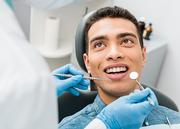 Man receiving dental exam