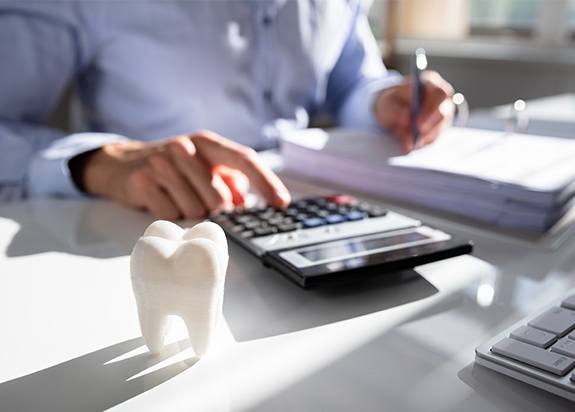 Patient completing dental insurance forms