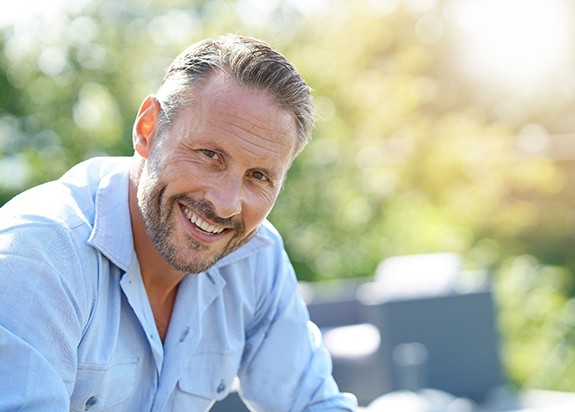 Smiling man with dental bridge in Fresno, CA