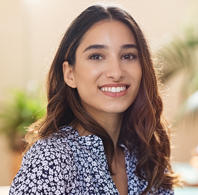 Woman sharing gorgeous smile after cosmetic dentistry