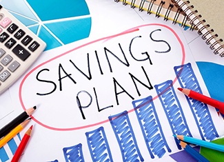 a piece of paper that says “Savings Plan” 