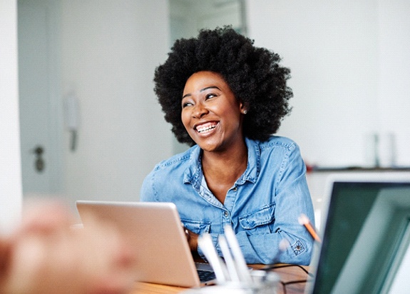 Woman smiling in office setting