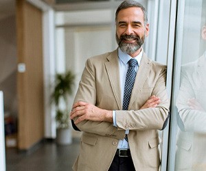 Man smiling in an office