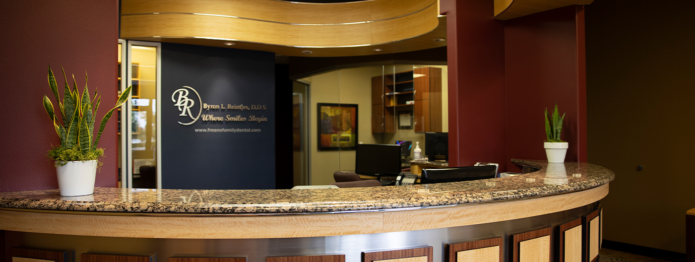 Smiling Dr. Byron DDS dental team