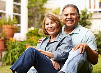 couple sitting in their lawn