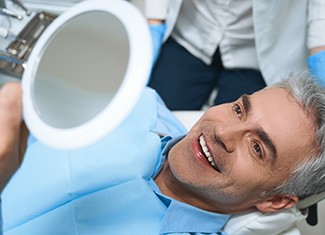 Man smiling at the dentist