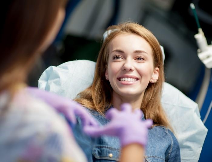 woman smiling in dental chair