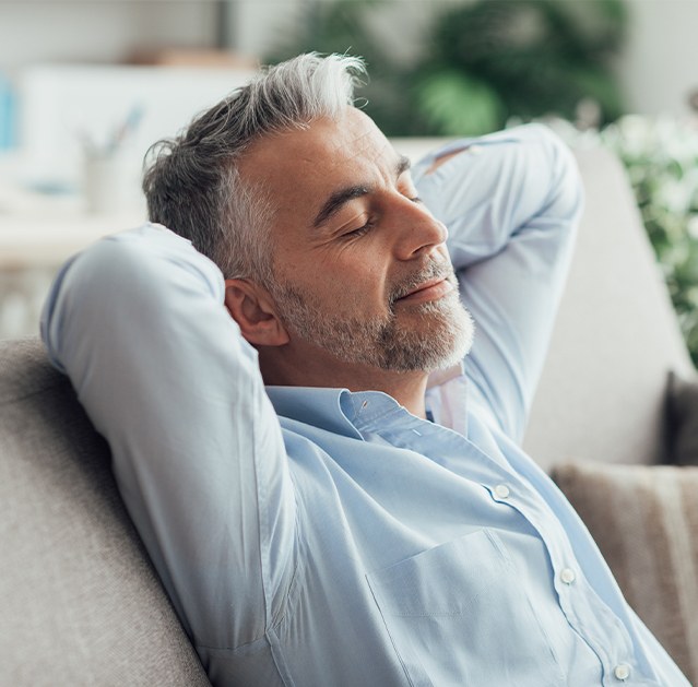 Man relaxing after sedation dentistry visit