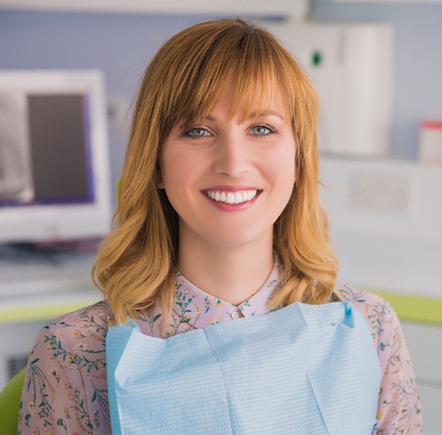 Smiling woman in modern dental office