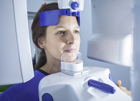 Woman receiving C T cone beam x-ray scan