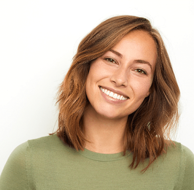 a woman smiling with tooth-colored fillings in Fresno