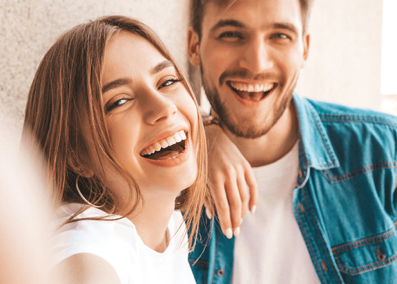 a couple smiling with tooth-colored fillings in Fresno