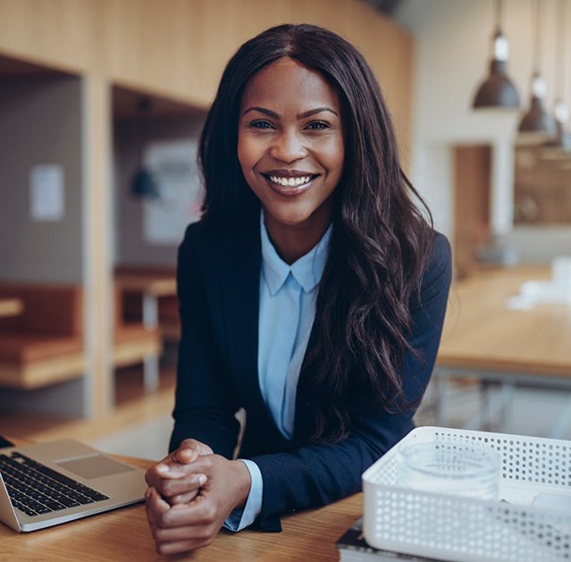 Businesswoman smiling with veneers in Fresno