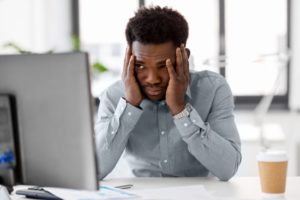 young man stressed out due to anxiety and sleep apnea