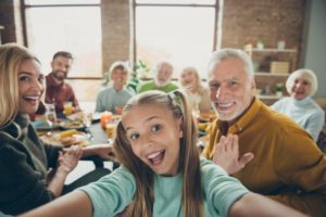 mature woman enjoying thanksgiving meal  