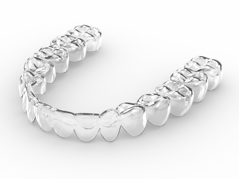 clear aligner lying on a table