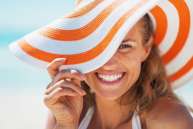 young woman smiling during summer