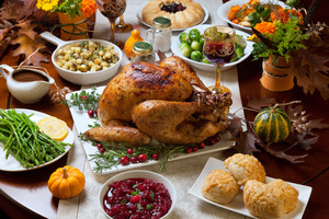 Turkey surrounded by other holiday foods