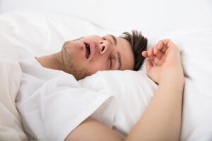 Man with obstructive sleep apnea