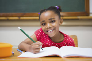 young girl in classroom