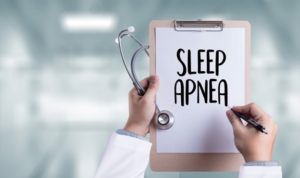 Sleep apnea written out on a clipboard.